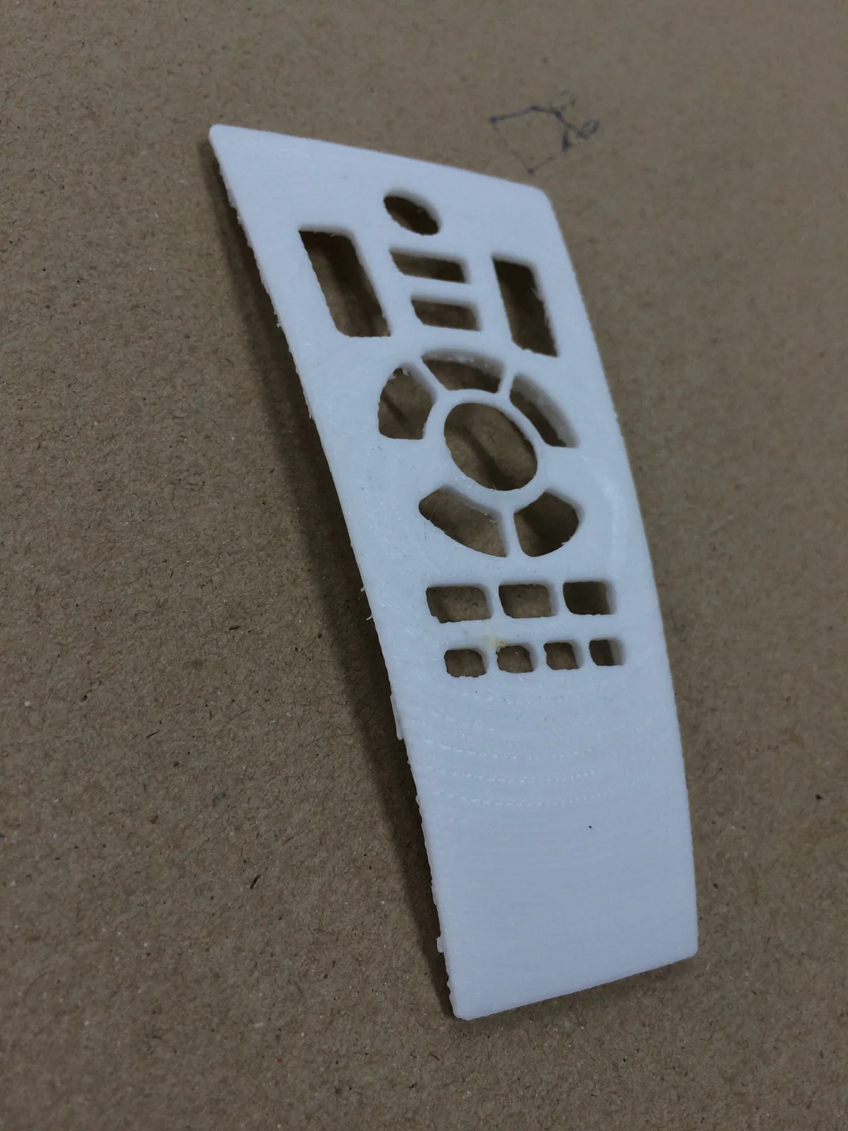 3D-printed remote face plate with button cut-outs