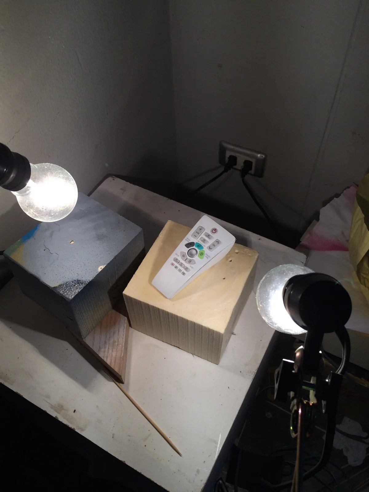 Finished remote drying under two work lamps in a spray area
